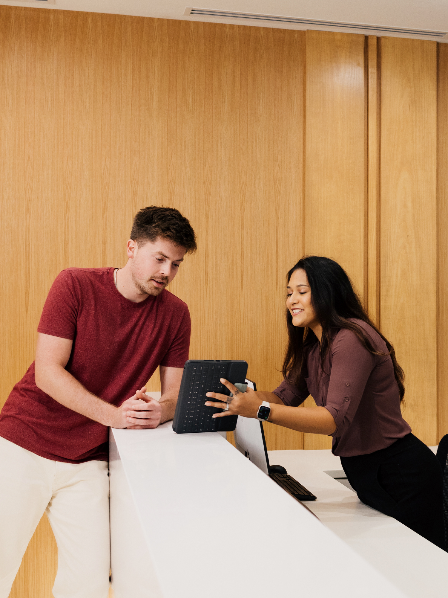 Staff member checking in a patient